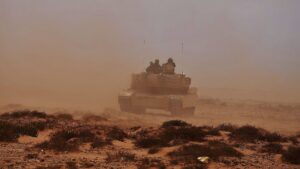 An armoured vehicle and crew during a desert training exercise in Morocco